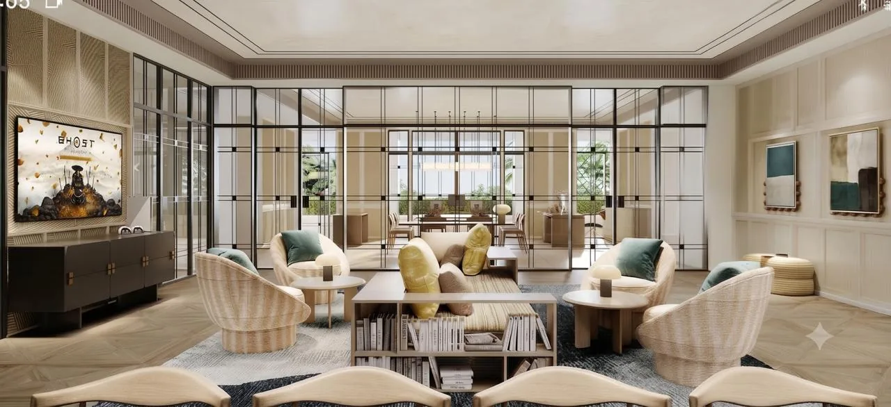 Grand clubhouse living lounge with double-height glazing at Lodha Beaumont Estate