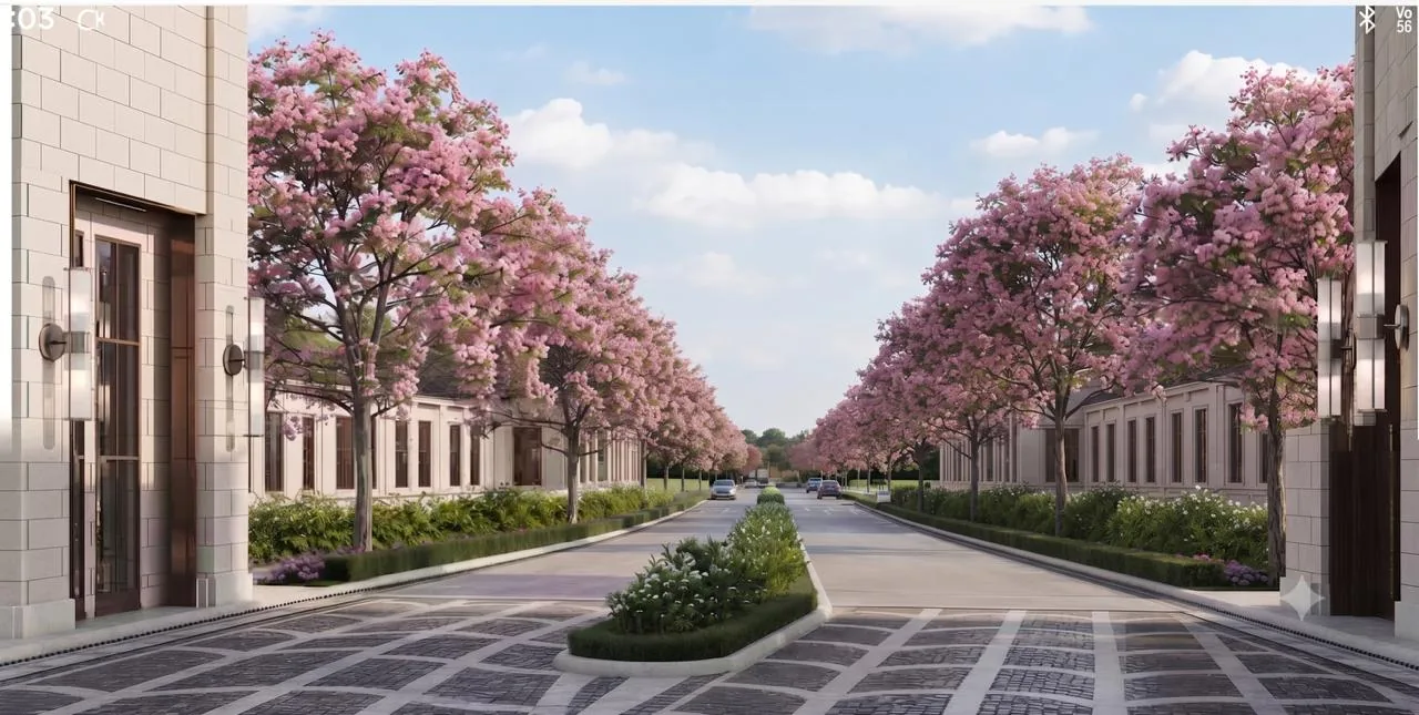 Tree-lined boulevard in bloom at Lodha Beaumont Estate’s neo-classical garden estate